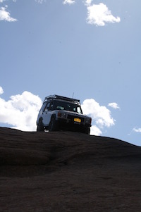 Land Rover on top of trail